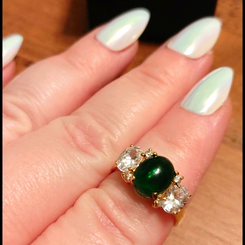 Ring with green stone size 6